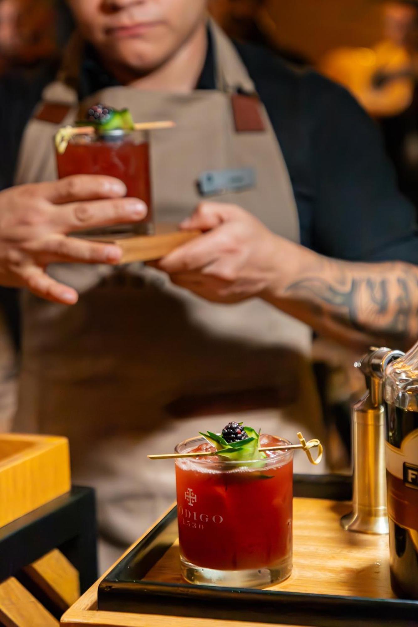 Hyatt Regency Andares Guadalajara Hotel Zapopan Exterior photo A bartender using a cocktail paddle to garnish a drink